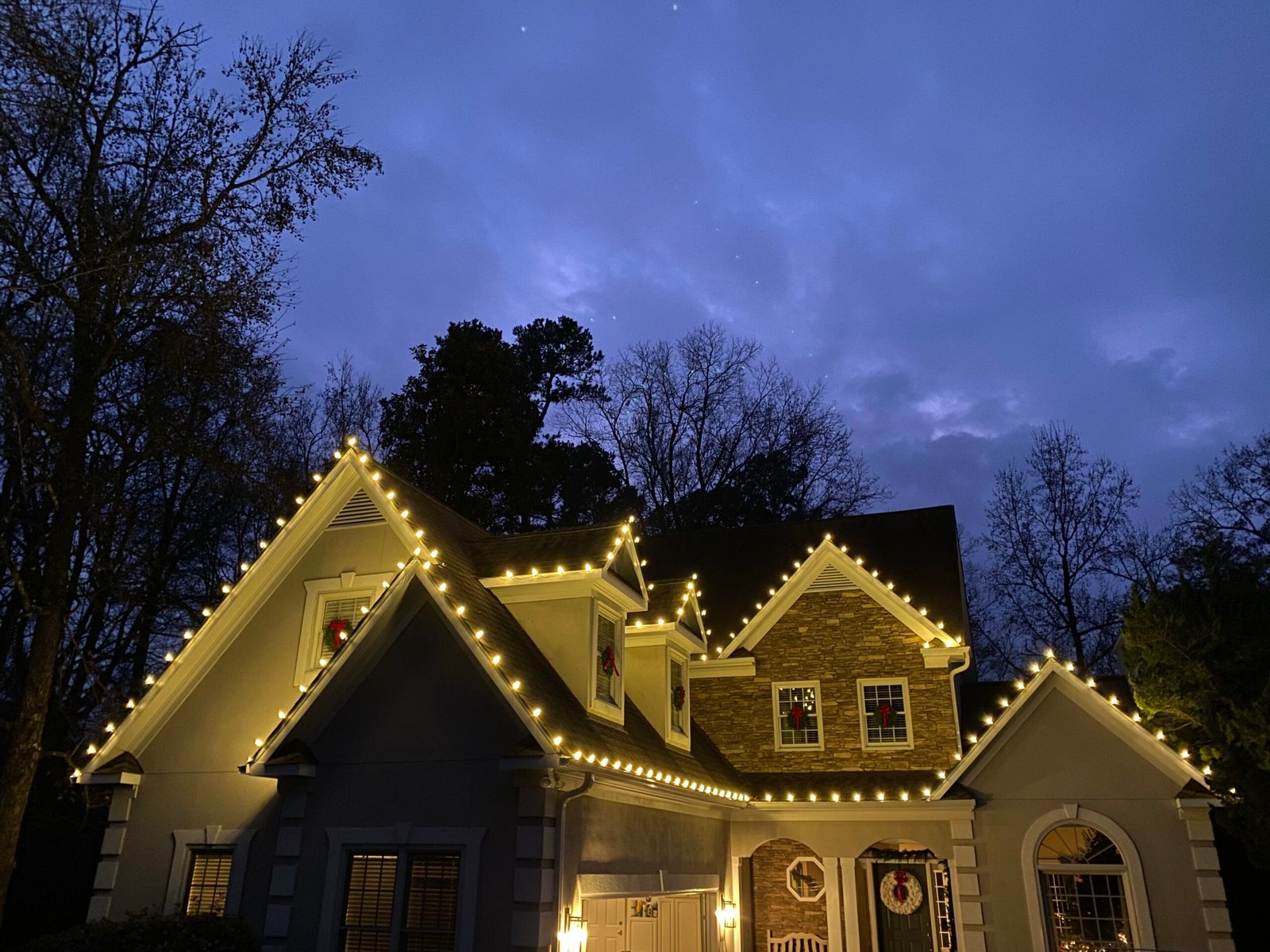 Custom professional Christmas lighting display on a home