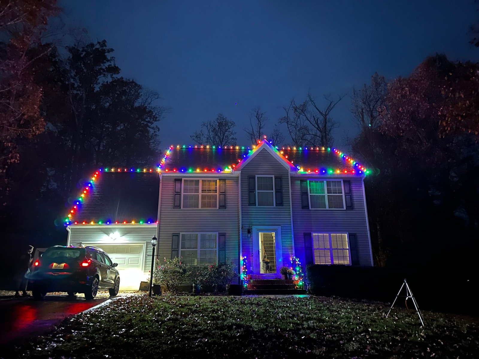 Multicolor C9 Christmas lights installed on a North Carolina home
